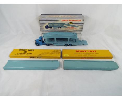 Dinky Toys - a boxed Dinky #982 Pullmore Car Transporter mid-blue cab and hubs light blue back and decks together with two bo