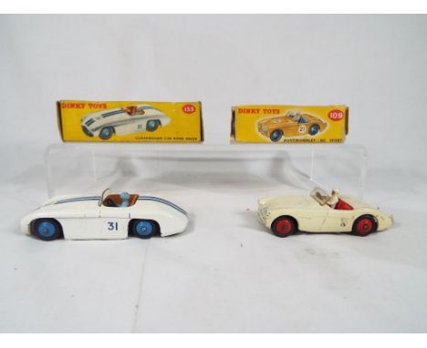 Dinky Toys - #133 Cunningham C-5R Road Racer white body with blue racing stripes, racing No. 31 blue hubs brown interior with