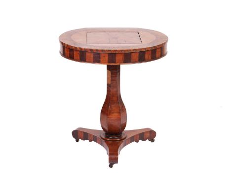 Of Irish interest; a 19th-century Irish arbutus wood and "Killarney" inlaid circular gaming table, the drawer bearing the leg