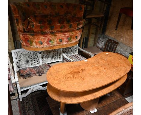 An Art Deco period upholstered two seater crescent form sofa to/with a walnut kidney shaped two tier coffee table (2)