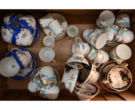 An early Victorian Staffordshire china set of six tea cups and saucers, finely floral-painted and gilded on a blue ground to/