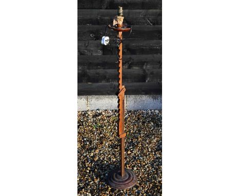 An adjustable wooden ratchet standard lamp