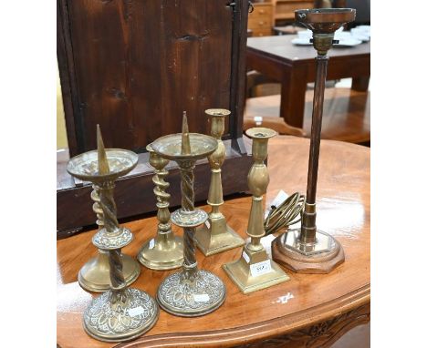 A pair of Victorian brass Gothic Revival pricket candlesticks, 30 cm to/w two other pairs of brass candlesticks and a vintage