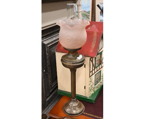 Copper oil-lamp with moulded pink glass shade