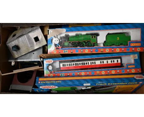 A boxed Hornby 00 gauge Thomas the Tank Engine series locomotive and two carriages to/w Track Extension Pack, Signal Box and 