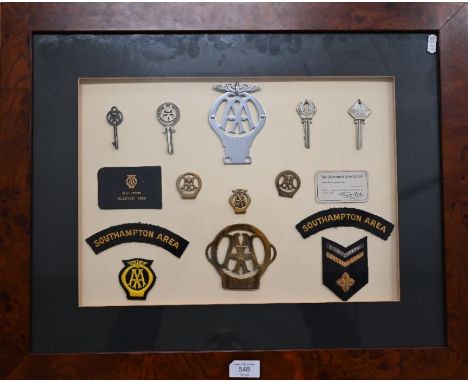 Vintage Automobile Association collectables including members car badges, patrolman shoulder titles etc, framed as a display