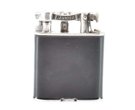 A 1930s silver hallmarked Dunhill lighter. The lighter having a black enamelled body with Dunhill mark to the mechanism. Hall