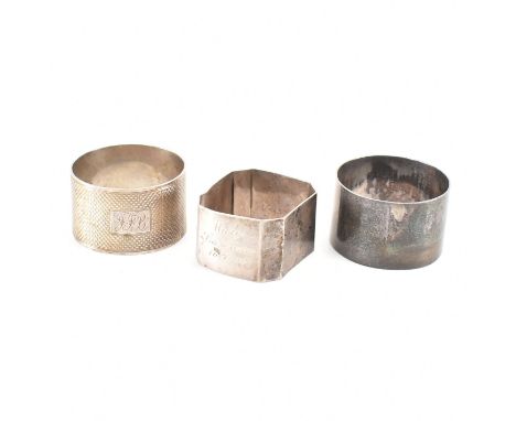 Three silver hallmarked napkin rings. The lot to include a napkin ring of canted rectangular form (hallmarked Birmingham 1935