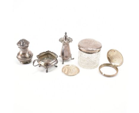 A group of antique silver hallmarked items. The lot to include a pepper pot (hallmarked Birmingham 1941), a silver pepper pot