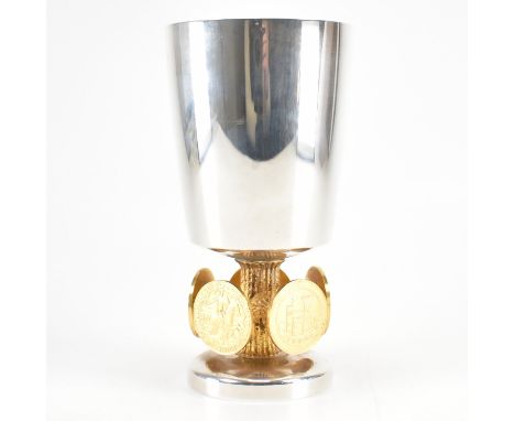 A silver hallmarked Stuart Devlin 'The Bristol 600 Goblet'. The goblet of footed tapering form having a gilt column with five