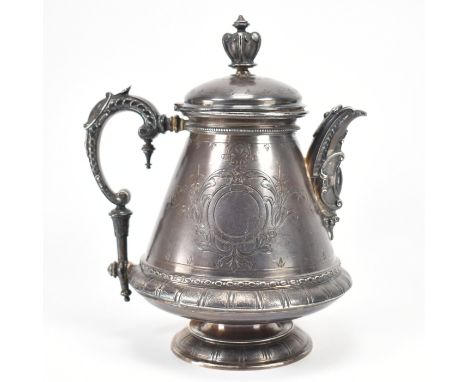 A German 800 silver hot water jug. The teapot having a hinged lid with moulded finial handle, scrolled handle, reverse taperi