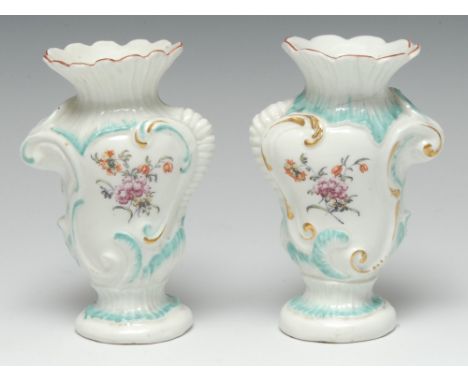 An early pair of Derby Patch Mark cartouche-shaped vases, painted after the Cotton-stem Painter in polychrome enamels with sp