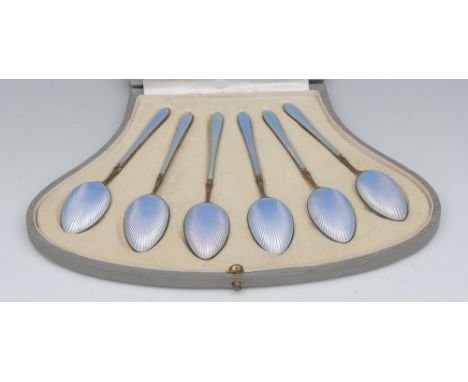 A set of six silver gilt and guilloche enamel coffee spoons, import marks, case with retailer mark Vickery, Regent St WProven