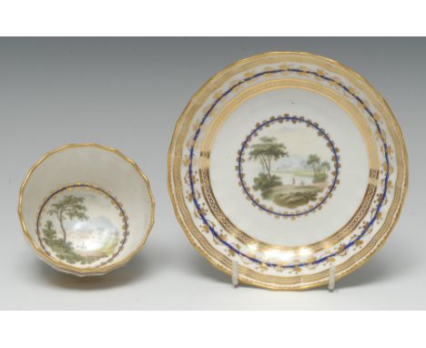 A Derby fluted tea bowl and saucer, pattern no. 86, painted by Zachariah Boreman, in polychrome enamels and wash with Picture