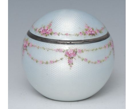 An early 20th century guilloche enamel and silver globular dressing table trinket box, enamelled with pink flowers and swags 