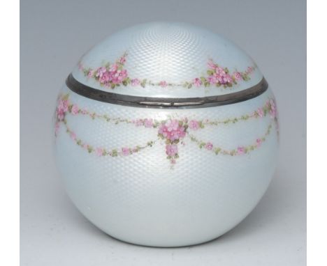 An early 20th century guilloche enamel and silver globular dressing table trinket box, enamelled with pink flowers and swags 