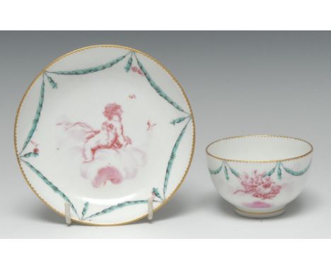 A Chelsea-Derby tea bowl and saucer, painted in the manner of Richard Askew en puce camaïeu with amorini and allegorical trop