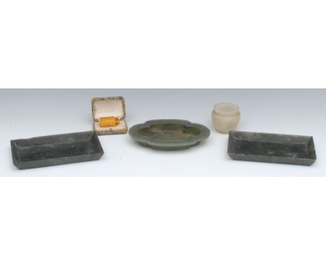 A 19th century Chinese Jade quatrefoil bonsai dish, 16cm wide; a pair of Chinese Jade rectangular trays, 16cm wide; a Chinese