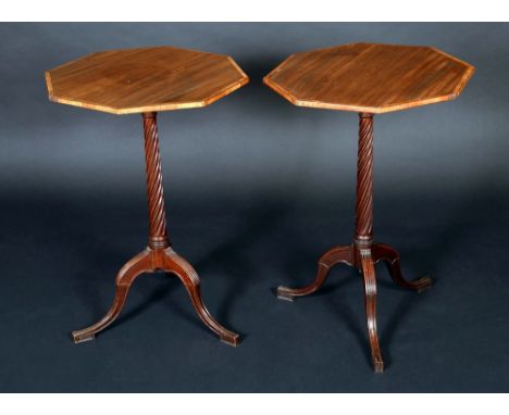 A pair of Edwardian satinwood crossbanded mahogany octagonal tripod occasional tables, of George III design, spirally fluted 