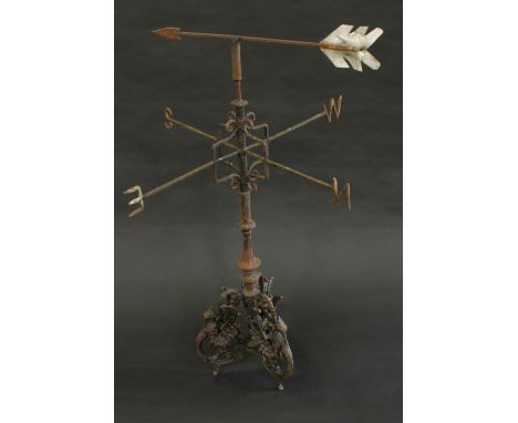 A 19th century cast metal weather vane, triform base cast with winged liver birds, 92cm high
