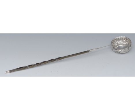 A Victorian silver toddy ladle, the bowl embossed with fruit and scrolls, wrythen horn handle Robert James Chaplin &amp; Sons