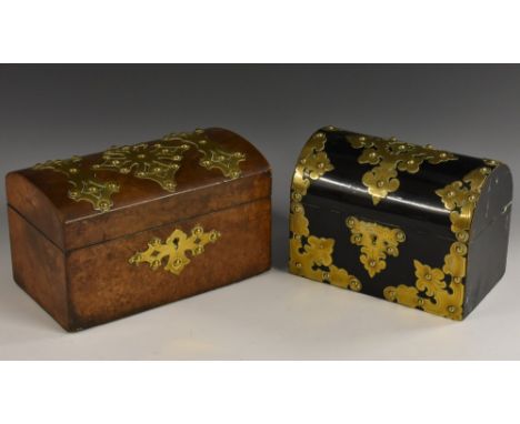 A Victorian Gothic Revival brass mounted coromandel domed rectangular stationery casket, applied overall with engraved brass 