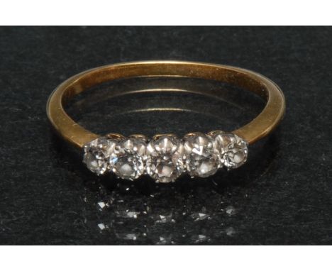 A diamond quintet line ring, linear set with five graduated round old cut diamonds, total estimated diamond weight approx 0.4