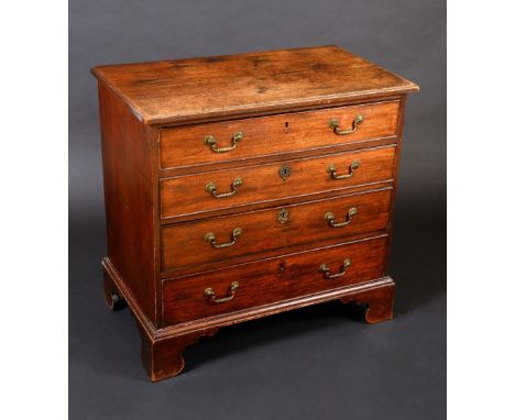 An early George III mahogany bachelors chest, moulded rectangular oversailing top above four long graduated cockbeaded drawer
