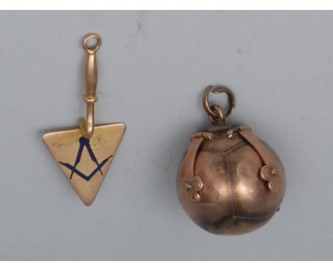 A Masonic globe and cross fob/orb, unfolding to form a cross from six pyramids, each engraved with twenty-four Masonic symbol