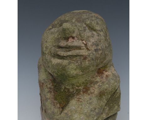 A 19th century grit stone stone corbel, of a grinning face, 34cm high