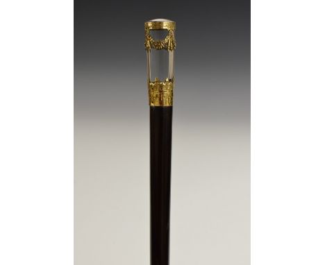 An early 20th century French silver-gilt mounted walking stick handle, in the Neo-Classical taste, hardwood shaft, 85cm long