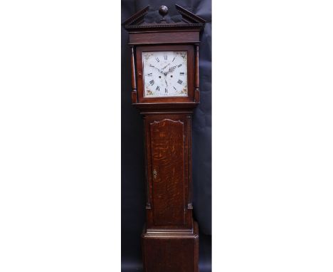 An 18th century oak long case clock, the 28cm painted square face inscribed Em Burton, Kendal, subsidiary seconds dial, twin 