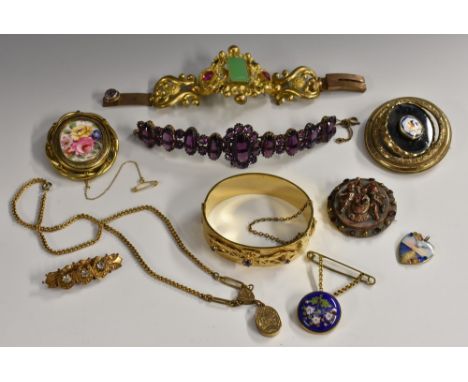 Jewellery - a 19th century gilt metal embossed floral jade and pink glass inset bracelet; Victorian mourning brooches, Cherub