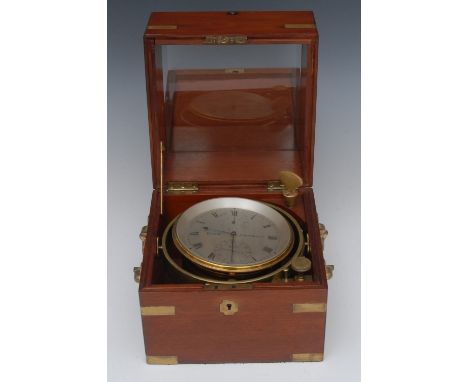 A  marine chronometer, the silvered dial with Roman numerals, inscribed Lund, London, subsidiary seconds dial and Wind Up ind