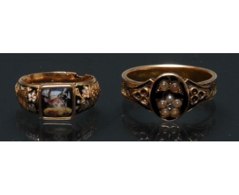A 19th century mourning ring, black enamel diamond and seed pearl floral panel crest, steped shoulders, hollow hairwork panel