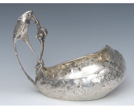 A substantial Russian silver bowl, in the form of a Kovsh, embossed with fruiting vine, stylised peacock handle, Kokoshnik ma