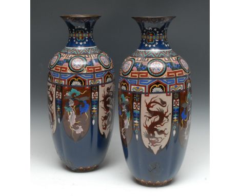 A pair of Chinese cloisonné vases, the shoulders with colourful geometric patterns, the sides with alternating panels of drag