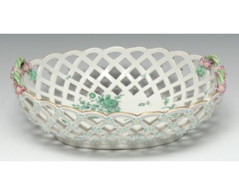 A large Derby Patch Mark basket, painted in green monochrome with roses and leafy foliage, green twin-ropetwist handles with 