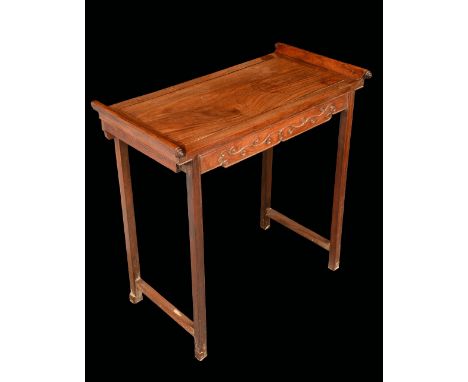 A Chinese hardwood altar-form side table, rectangular panel top with scroll ends, above a deep frieze carved in relief, squar