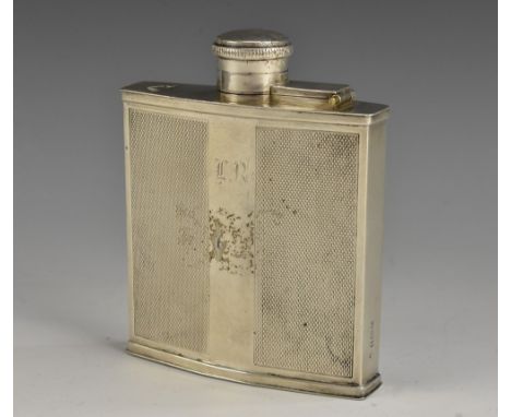 An Art Deco silver canted rectangular hip flask, engine turned, 10.5cm high, London 1958  