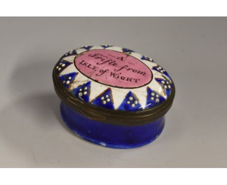 A George III South Staffordshire enamel oval patch box, hinged cover inscribed A Trifle from Isle of Wight, on a pink reserve