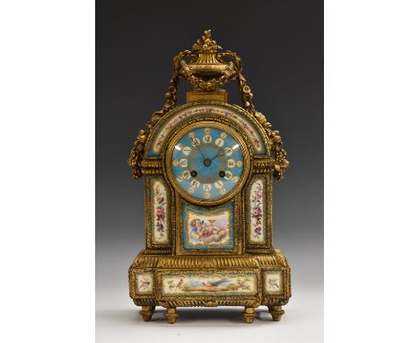 A French Second Empire porcelain mounted gilt bronze mantel clock, by Futvoye, Paris, 11.5cm circular dial with Roman and sub