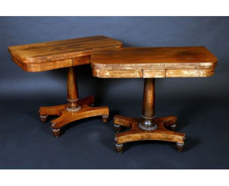 A pair of George IV rosewood D-shaped card tables, each folding top enclosing an inset baize lined playing surface, above a d