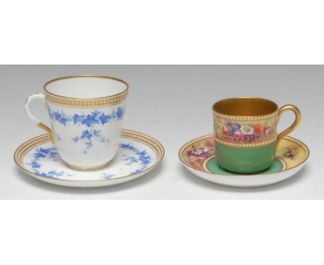 A Royal Worcester cabinet coffee cup and stand, painted by E. Phillips with friezes of country flowers in bloom, green ground