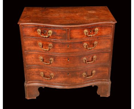 A George III mahogany serpentine bachelors chest, moulded top above two short and three long graduated cockbeaded drawers, gi