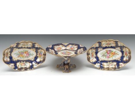 A Royal Worcester dessert comport and a pair of shaped dishes, painted in the 18th century taste after Ernest Phillips, with 