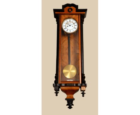 A 19th century walnut and ebonised Vienna regulator wall clock, 16.5cm enamel dial with Roman numerals, subsidiary seconds di