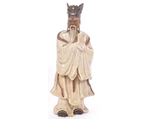 An early 20th Century Chinese / Oriental deities, wise man porcelain figurine, possibly Guan Yu - the warrior god. The figure