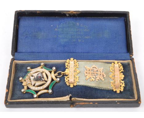 A 19th century and 20th century&nbsp; 9ct gold and gilt hallmarked silver Masonic Alma Lodge Roll of Honour medal. The medal 