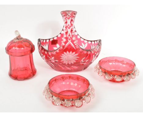 A collection of four mid 20th century cranberry glass pieces by 'Margaret, West Germany'.&nbsp;To include four hand cut lead 